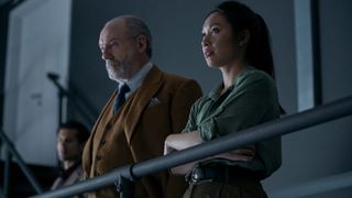 Liam Cunningham as Wade, Jess Hong as Jin Cheng in episode 108 of 3 Body Problem
