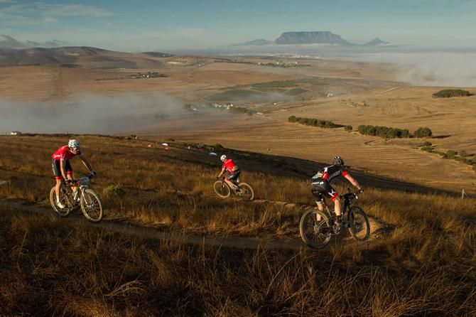 Riders zig-zag down singletrack