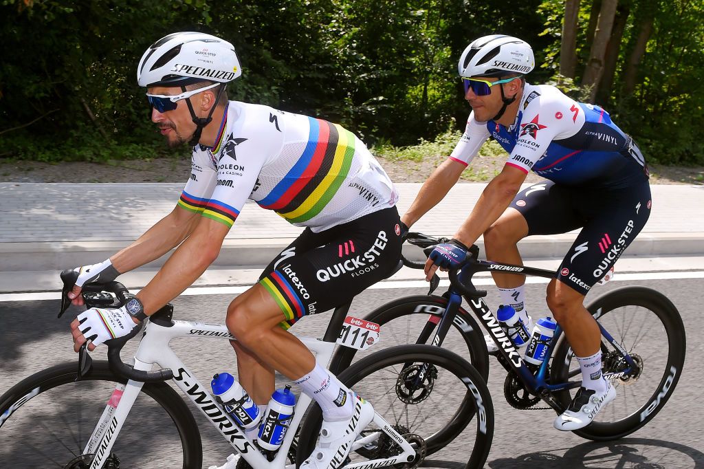 HUY BELGIUM JULY 23 Julian Alaphilippe of France and Stijn Steels of Belgium and Team QuickStep Alpha Vinyl compete during the 43rd Ethias Tour de Wallonie 2022 Stage 1 a 1744km stage from Temploux to Huy 204m ethiastourdewallonie22 on July 23 2022 in Huy Belgium Photo by Luc ClaessenGetty Images