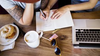 Freelancers working in coffee shop