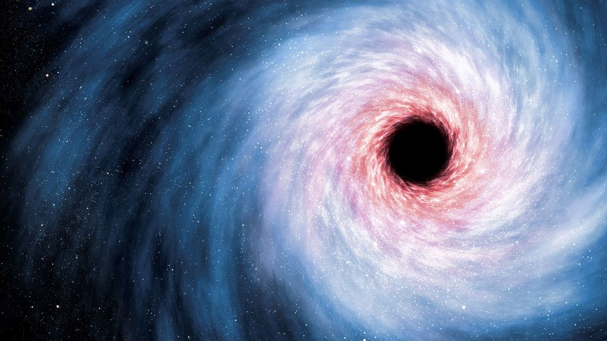 Artist&#039;s illustration of a supermassive black hole shows a large circular black void on the right with swirls of blue, pink and orange gathering toward the center. 