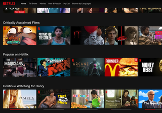 The Netflix home screen shows three rows of content, with Critically Acclaimed Films, Popular on Netflix and Continue Watching for Henry.