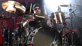 Jason Bonham performs on stage with Sammy Hagar