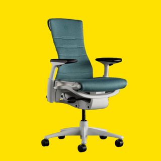 An image of the Logitech G x Herman Miller Embody office chair gaming, against a yellow background