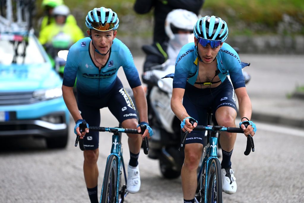 MONTE BONDONE ITALY MAY 23 LR Vadim Pronskiy of Kazakhstan and Christian Scaroni of Italy and Astana Qazaqstan Team compete in the breakaway during the 106th Giro dItalia 2023 Stage 16 a 203km stage from Sabbio Chiese to Monte Bondone 1642m UCIWT on May 23 2023 in Monte Bondone Italy Photo by Tim de WaeleGetty Images