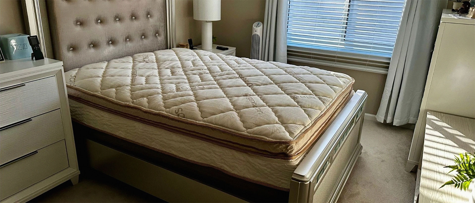 The Saatva Solaire mattress in a bedroom