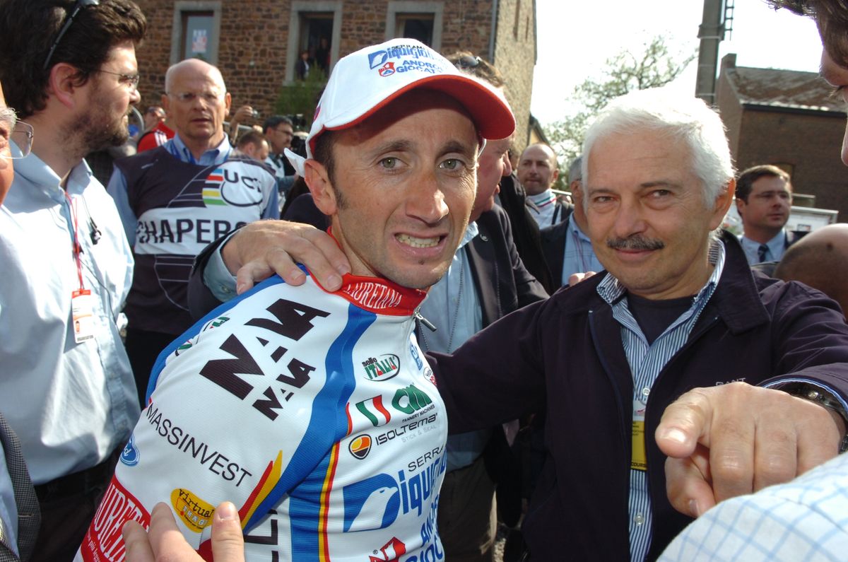 Rebellin and Diquigiovanni&ndash;Androni manager Gianni Savio celebrate his third Fleche win in 2009. Days later, news of his positive test from Beijing would emerge, and his career and life would never be the same.