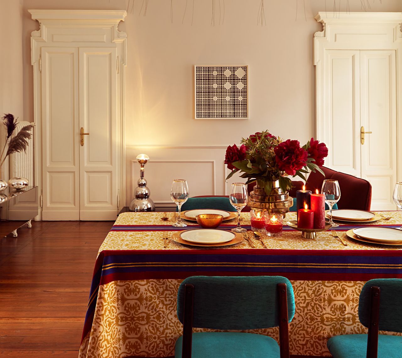 A tablescape with plates laid at the table