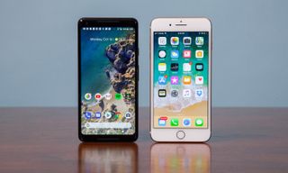 A Google Pixel 2 and an Apple iPhone 8 side-by-side.