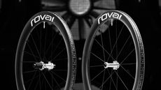 The new Roval Rapide CLX Team wheelset stand in front of the fan inside a wind tunnel