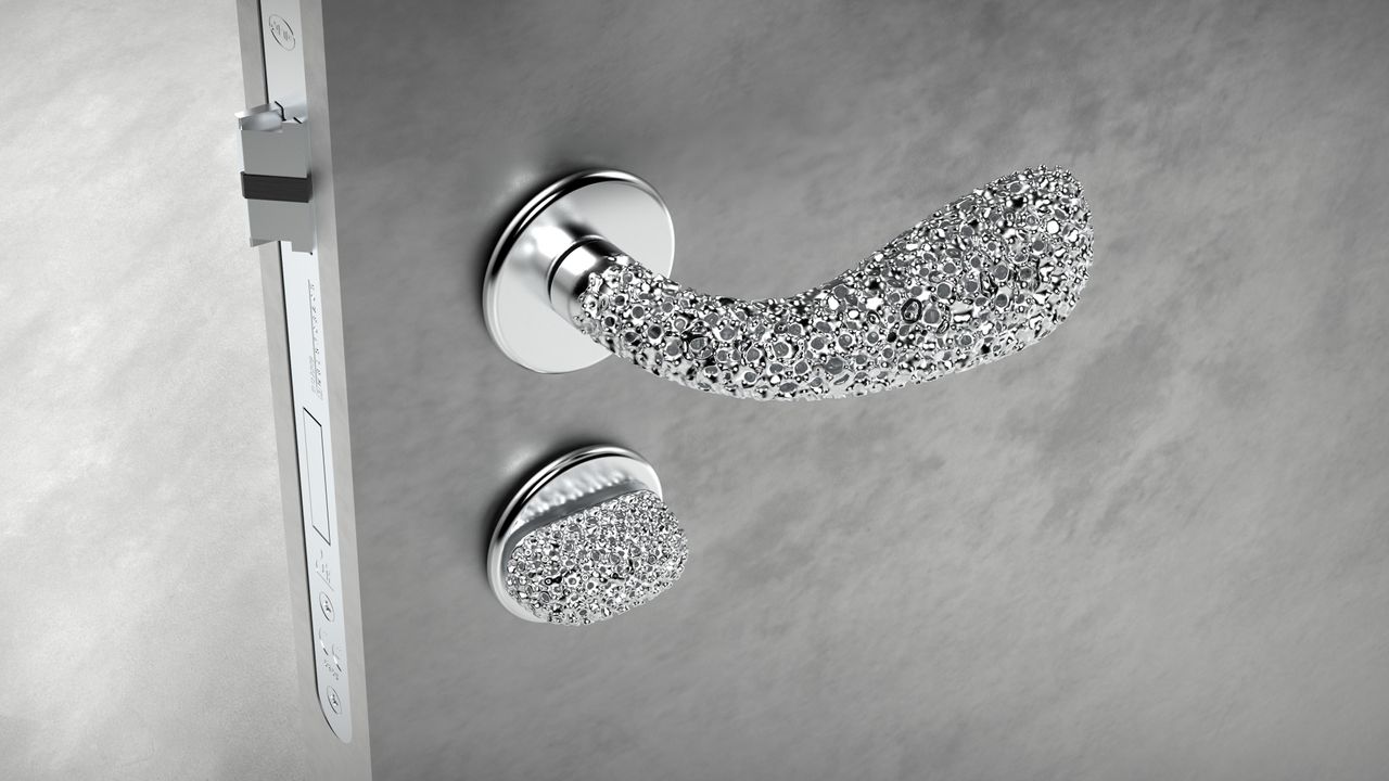 silver door handle on grey door
