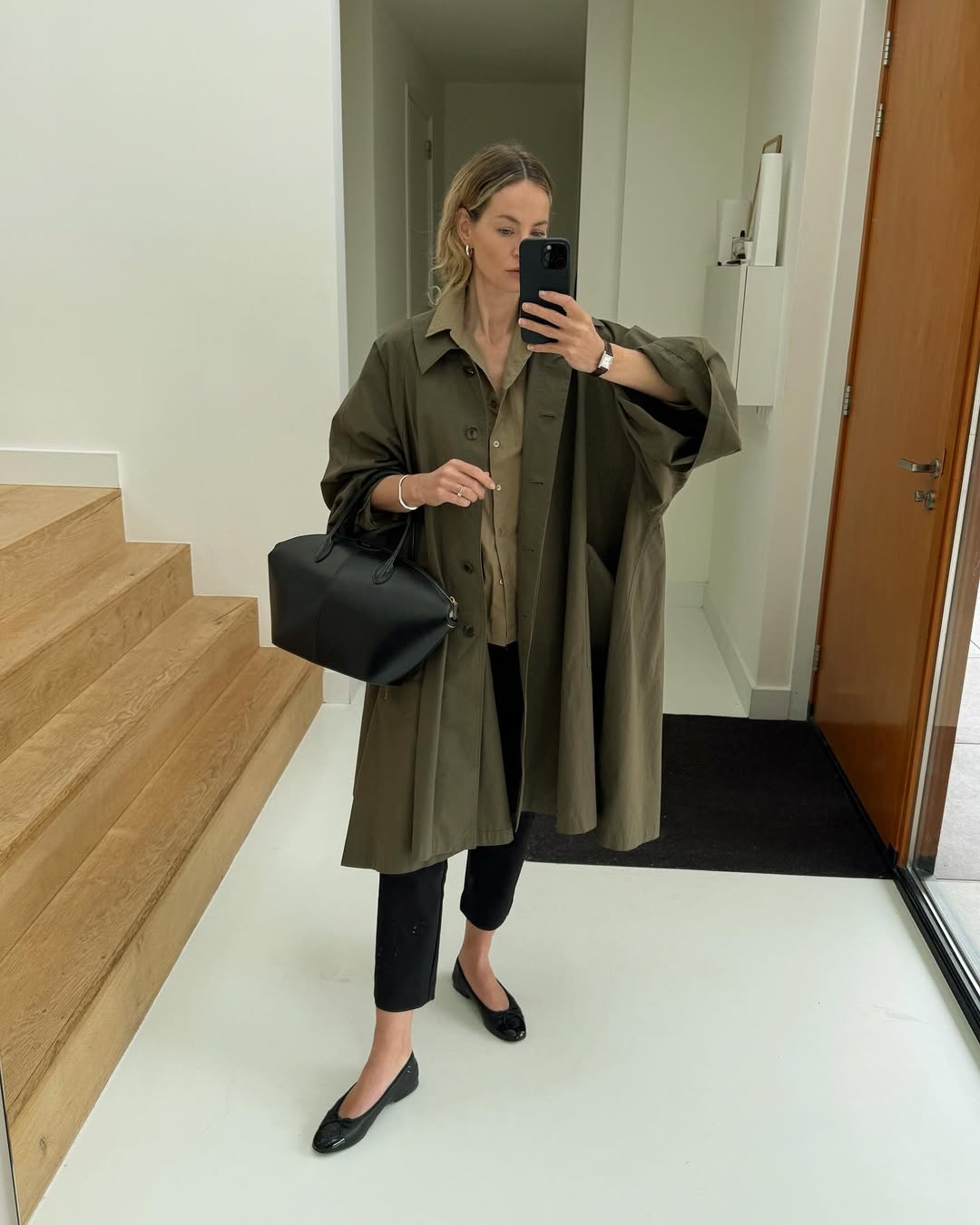 @anoukyve wearing ballet flats with black trousers
