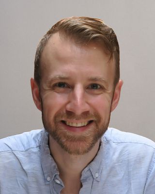 Smiling headshot of Fulcrum Immersive Luke Vogel.