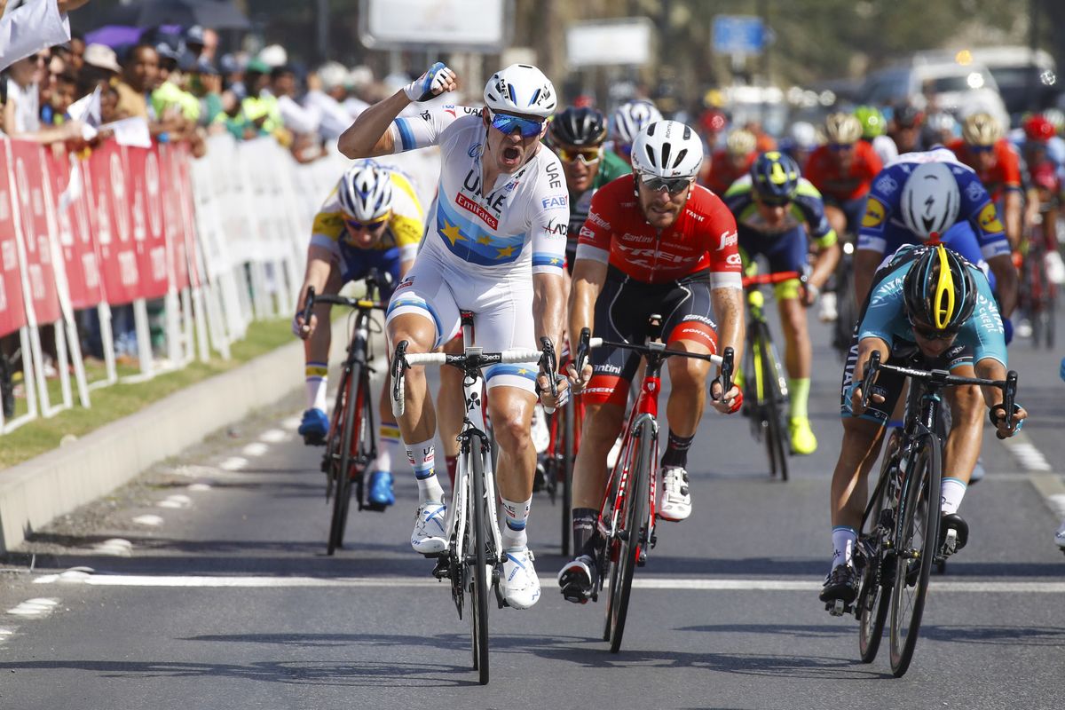 Alexander Kristoff (UAE Team Emirates) hits the line first