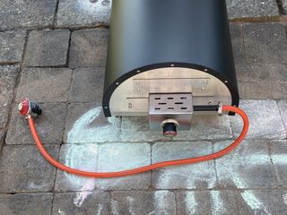 The gas attachment fixed to the back of the Woody pizza oven