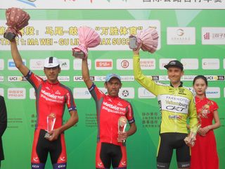 Arvin Moazami Godarzi and Rahim Emami (Pishgaman Giant Team) and Peter Schulting (Parkhotel Valkenburg) on the Tour of Fuzhou stage 1 podium