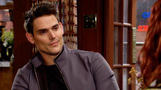 Mark Grossman as Adam smirking in The Young and the Restless