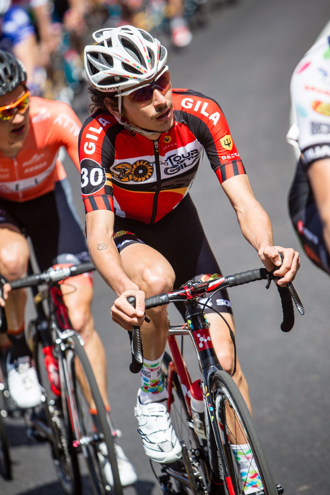 Lachlan Morton (Jelly Belly) riding in the bunch