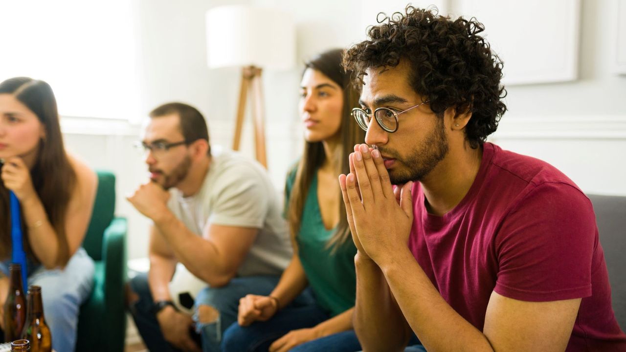 Fans watch sports on TV