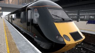 A black and yellow train