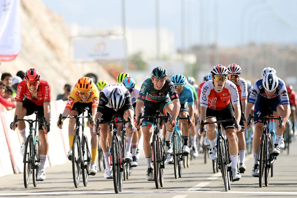 YITTI HILLS OMAN FEBRUARY 14 A general view of Diego Ulissi of Italy and UAE Team Emirates Axel Zingle of France and Team Cofidis Jenthe Biermans of Belgium and Team ArkeaSamsic Ide Schelling of The Netherlands and Team BoraHansgrohe Louis Bendixen of Denmark and UnoX Pro Cycling Team and Jordi Warlop of Belgium and Team Soudal Quick Step sprint to win at finish line during the 12th Tour of Oman 2023 Stage 4 a 2049km stage from Izki to Yitti Hills 147m TourofOman on February 14 2023 in Yitti Hills Oman Photo by Alex BroadwayGetty Images