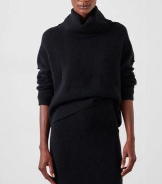 Image of black roll neck