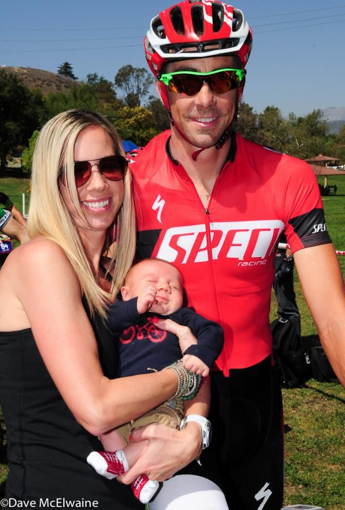Todd and Meg Wells with their son Cooper at the starting line