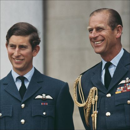 Prince Charles, the Prince of Wales, receives his wings at RAF Cranwell in Lincolnshire, UK, 20th August 1971. On the right is his father who is Marshal of the Royal Air Force
