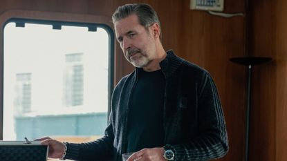 Kevin looks at something offscreen