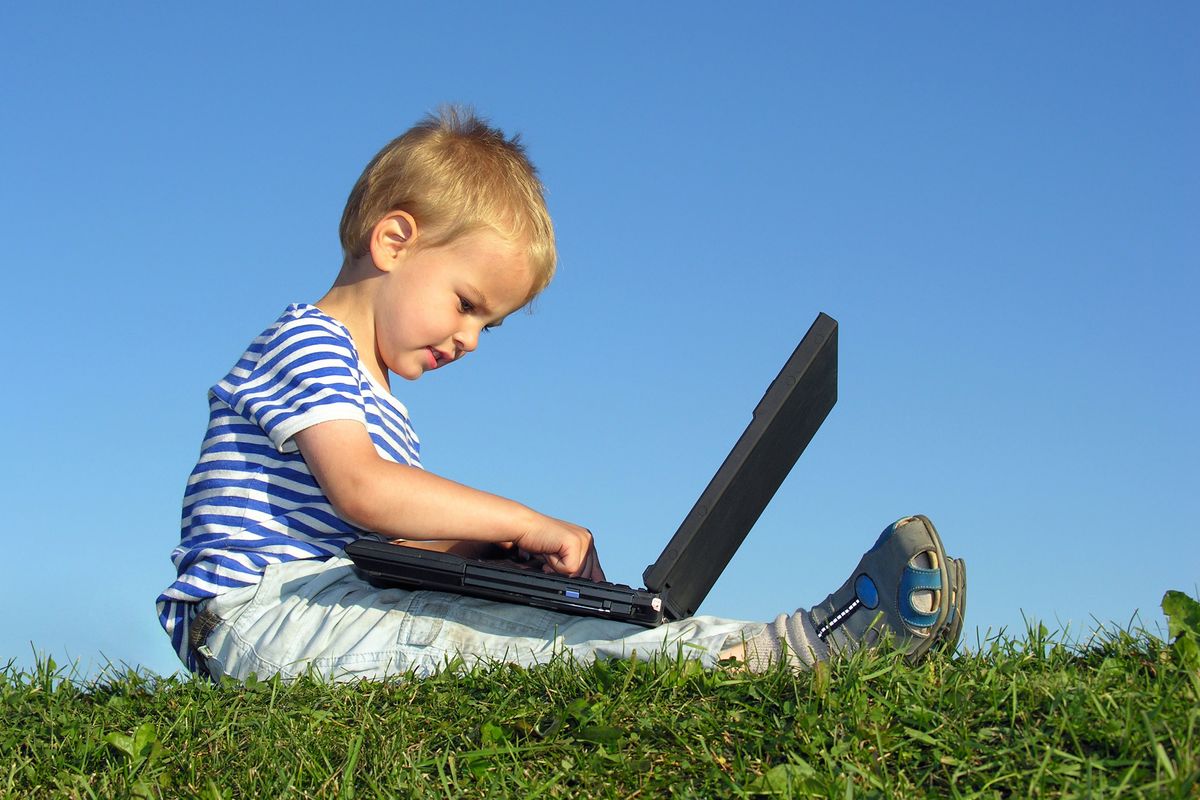 kid with computer