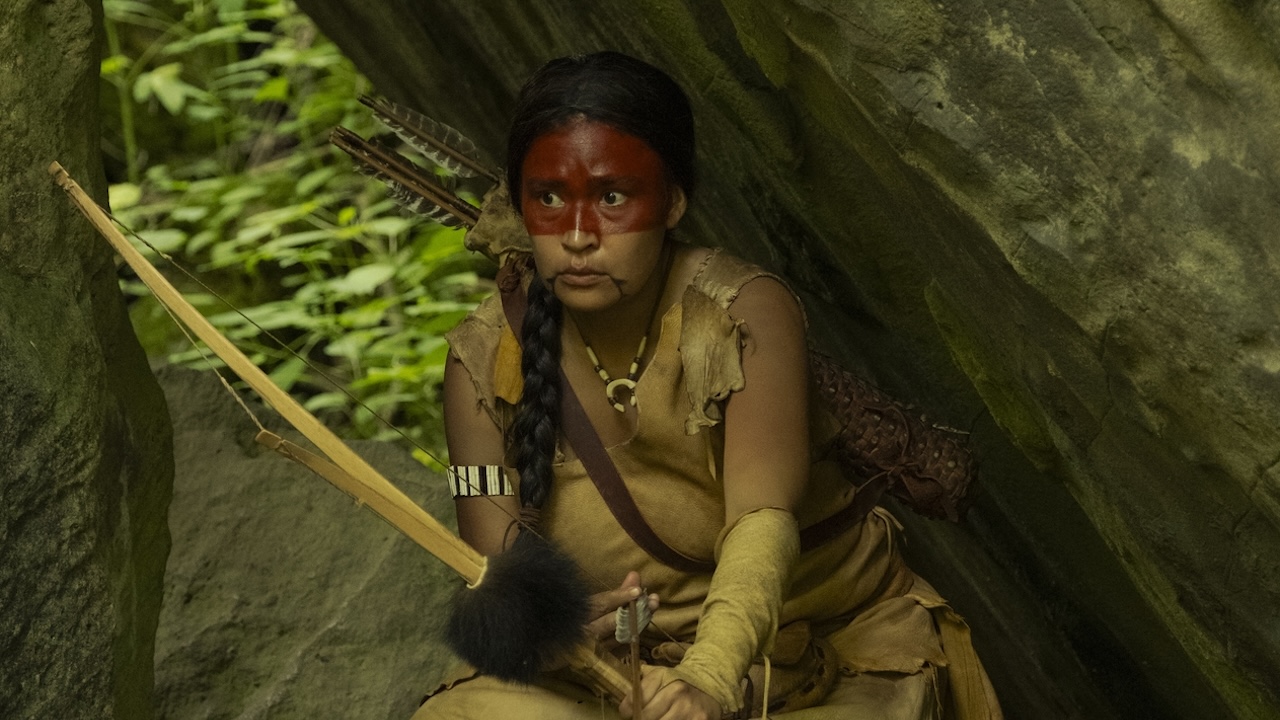 Indigenous woman with bow and arrow in IT: Welcome to Derry Episode 4