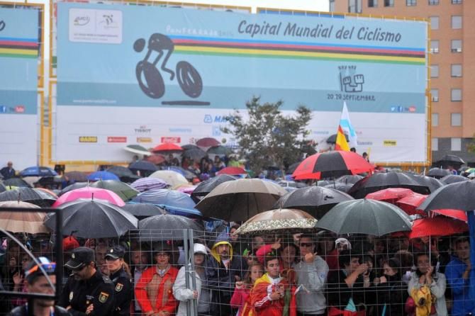 An umbrella was a good accessory to have if you were watching the race today