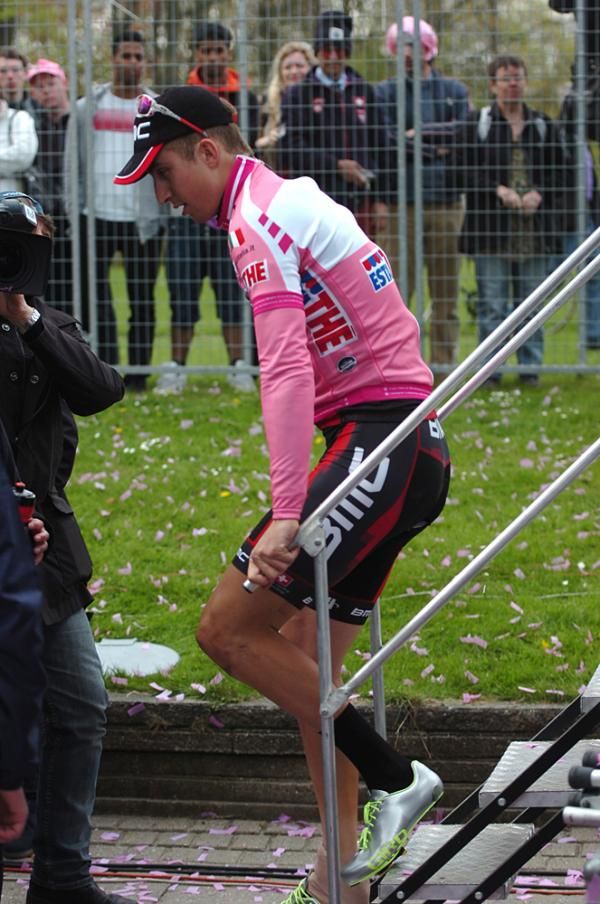 Taylor Phinney limps down the steps from the Giro d'Italia podium
