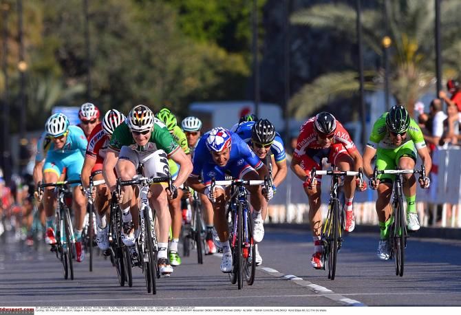 Andre Greipel (Lotto Belisol) lunges for the line on the final day of the Tour of Oman,