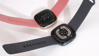 Fitbit Sense 2 and Fitbit Versa 4 sensors on back of watches