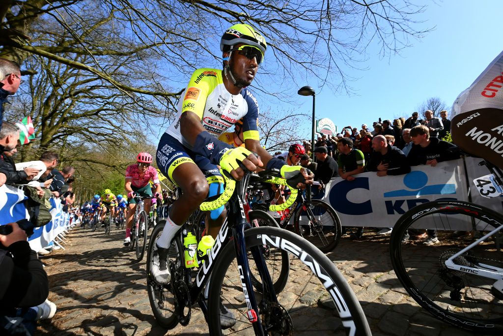 WEVELGEM BELGIUM MARCH 27 Hailu Biniam Girmay of Eritrea and Team Intermarch Wanty Gobert Matriaux competes through a cobblestones sector during the 84th GentWevelgem in Flanders Fields 2022 Mens Elite a 2488km one day race from Ypres to Wevelgem GWE22 WorldTour on March 27 2022 in Wevelgem Belgium Photo by Tim de WaeleGetty Images