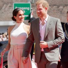 Prince Harry, Duke of Sussex and Meghan, Duchess of Sussex arrive at the town hall during the Invictus Games Dusseldorf 2023 - One Year To Go events, on September 06, 2022 in Dusseldorf, Germany. 