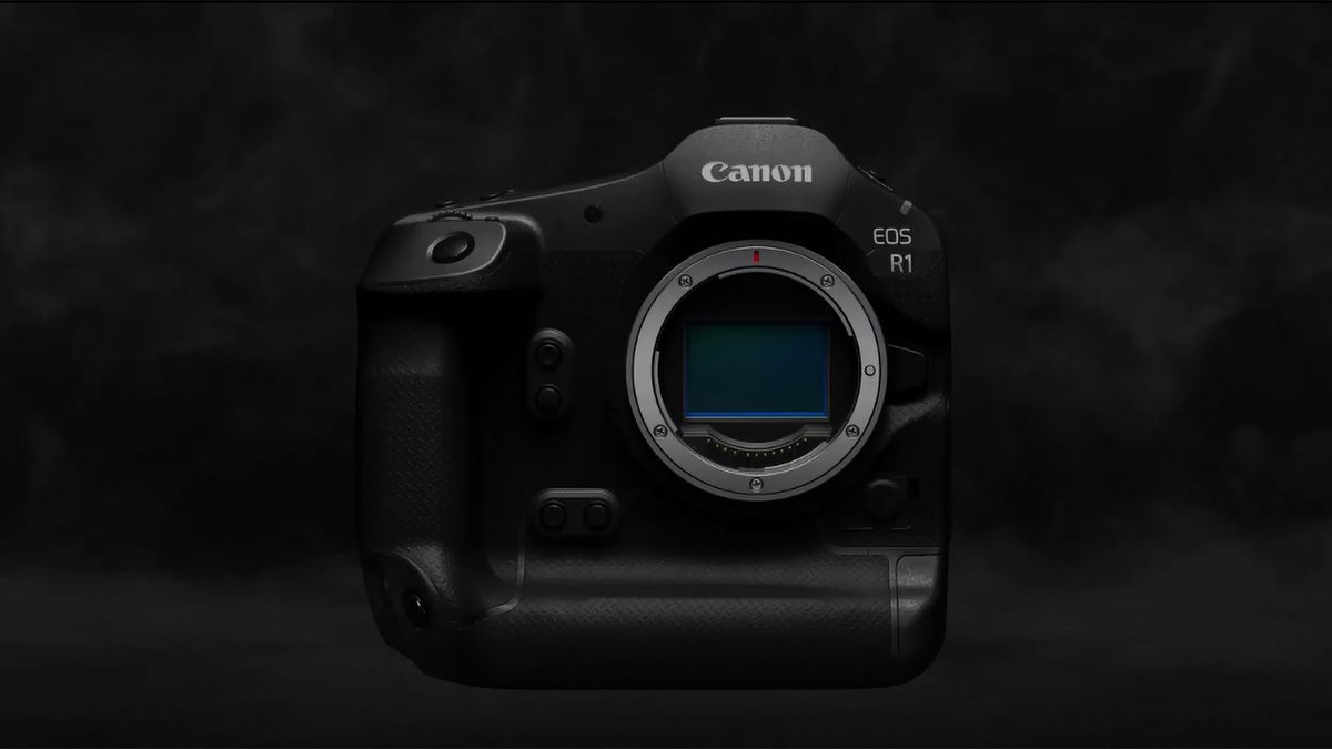 Canon EOS R1 camera body no lens attached on a dark background