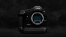 Canon EOS R1 camera body no lens attached on a dark background
