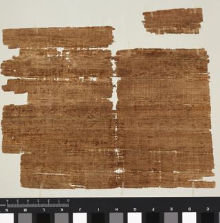 The ancient amulet, which consisted of a mix of biblical passages, was written on the back of a receipt for payment of a grain tax.