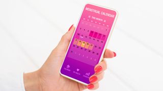 Menstrual tracking security on a phone held by a woman