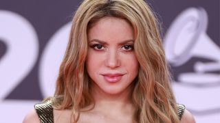Shakira pictured with warm blonde hair
