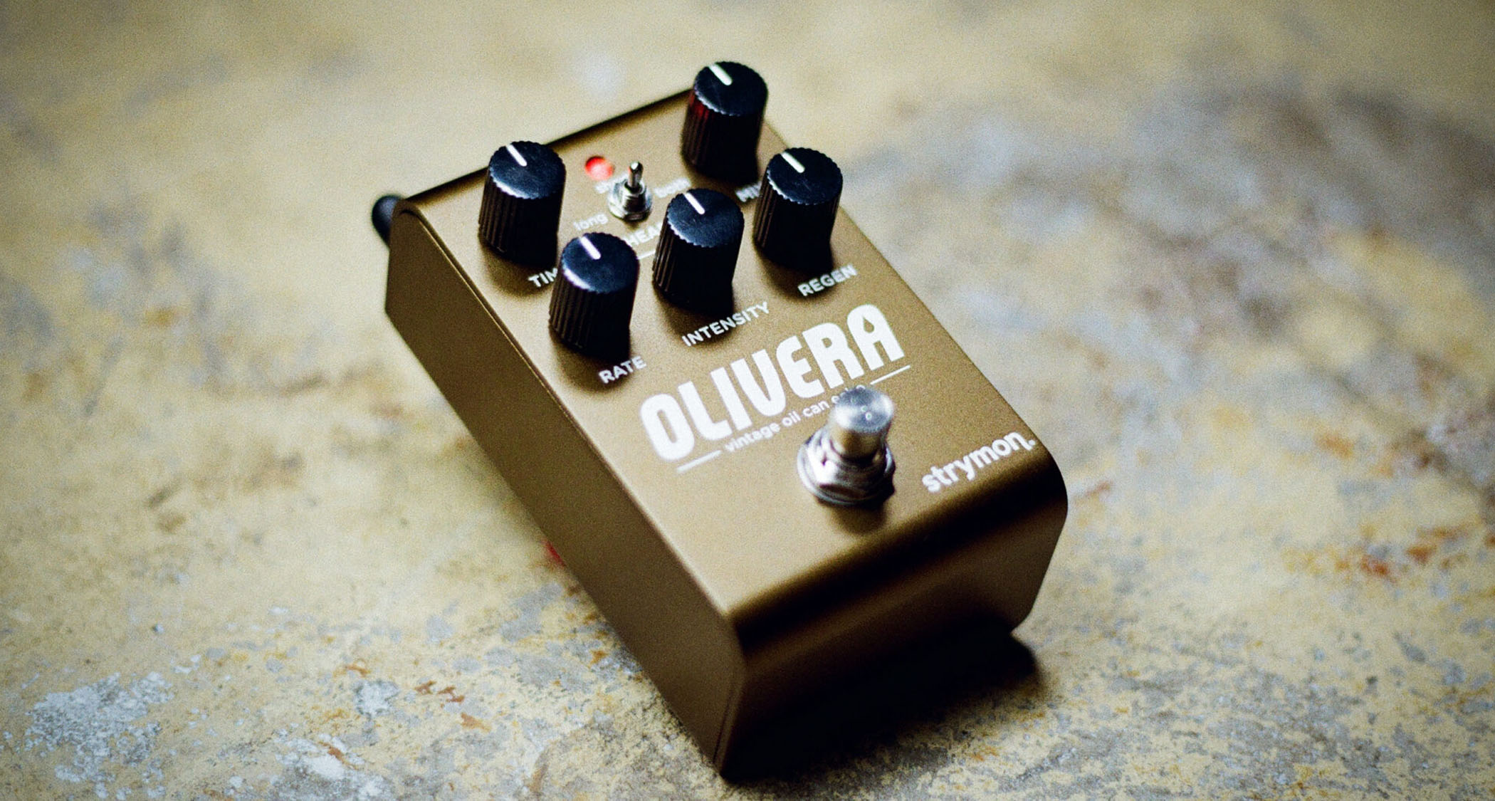 The Strymon Olivera is a five-knob stompbox in bronze-brown that offers an emulation of an oil-can delay