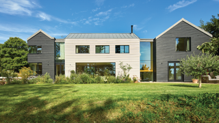 Exterior of house with lawn in front of it