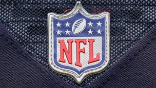 A detail view of the NFL crest logo on a Chicago Bears jersey