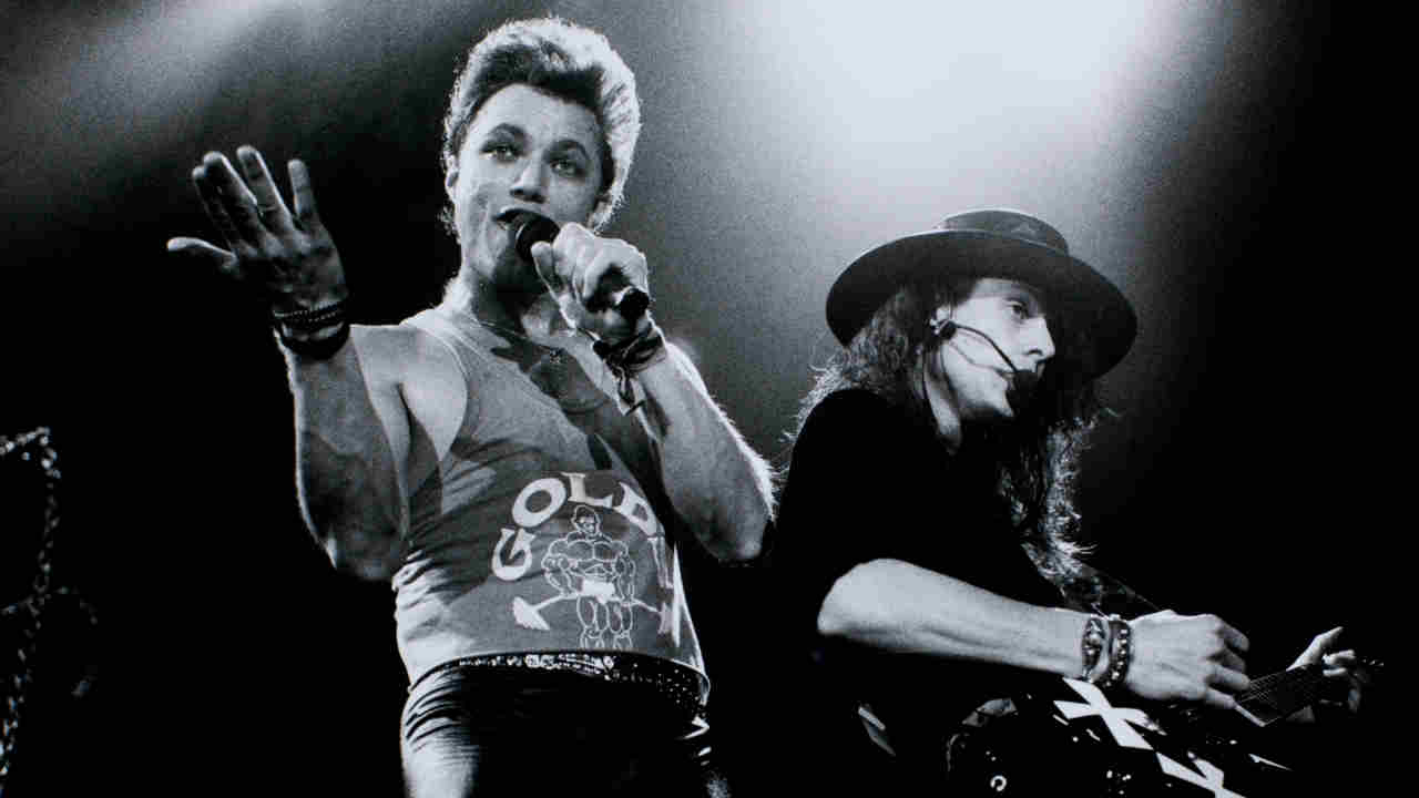 Queensryche’s Geoff Tate and Chris DeGarmo performing onstage in 1989