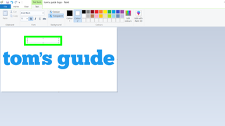 How to edit images in MS Paint - a screenshot of the "Text" tool being used in Microsoft Paint