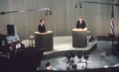 Richard Nixon (left), debates John F. Kennedy (right), during a live broadcast of their fourth presidential debate on October 21, 1960.