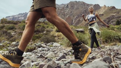 best hiking boots: Columbia's Facet 75 hiking boots worn in the mountains