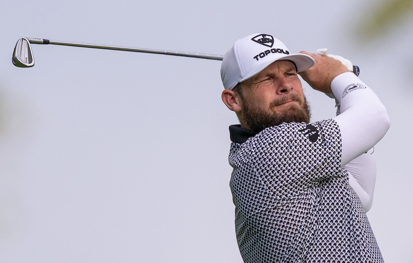Tyrrell Hatton holds his finish on an iron shot